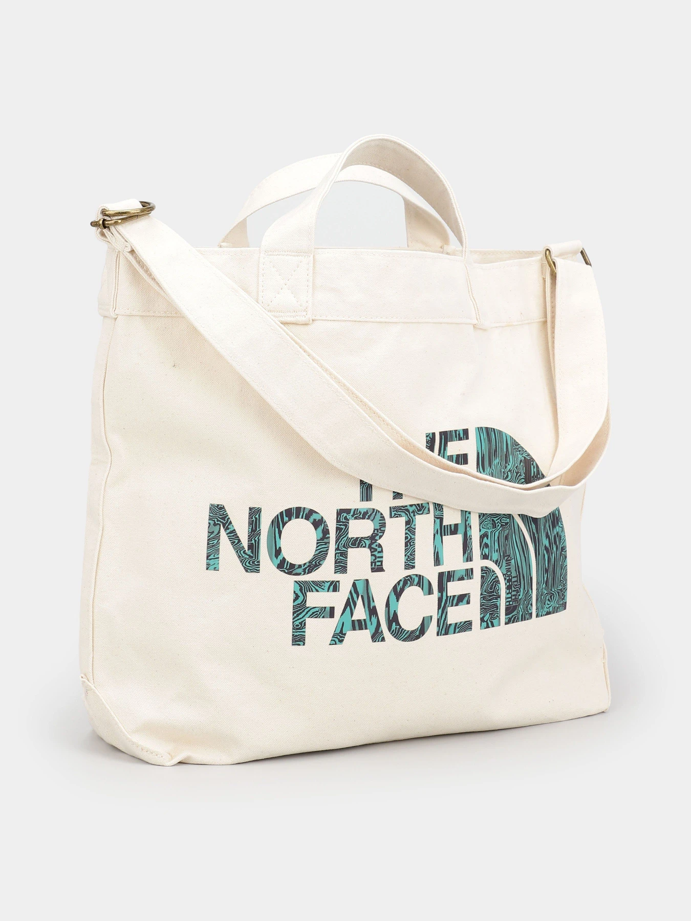 Сумки The North Face ADJUSTABLE COTTON TOTE модель NF0A81BROM71 Сумки The North Face ADJUSTABLE COTTON TOTE модель NF0A81BROM71 Фото