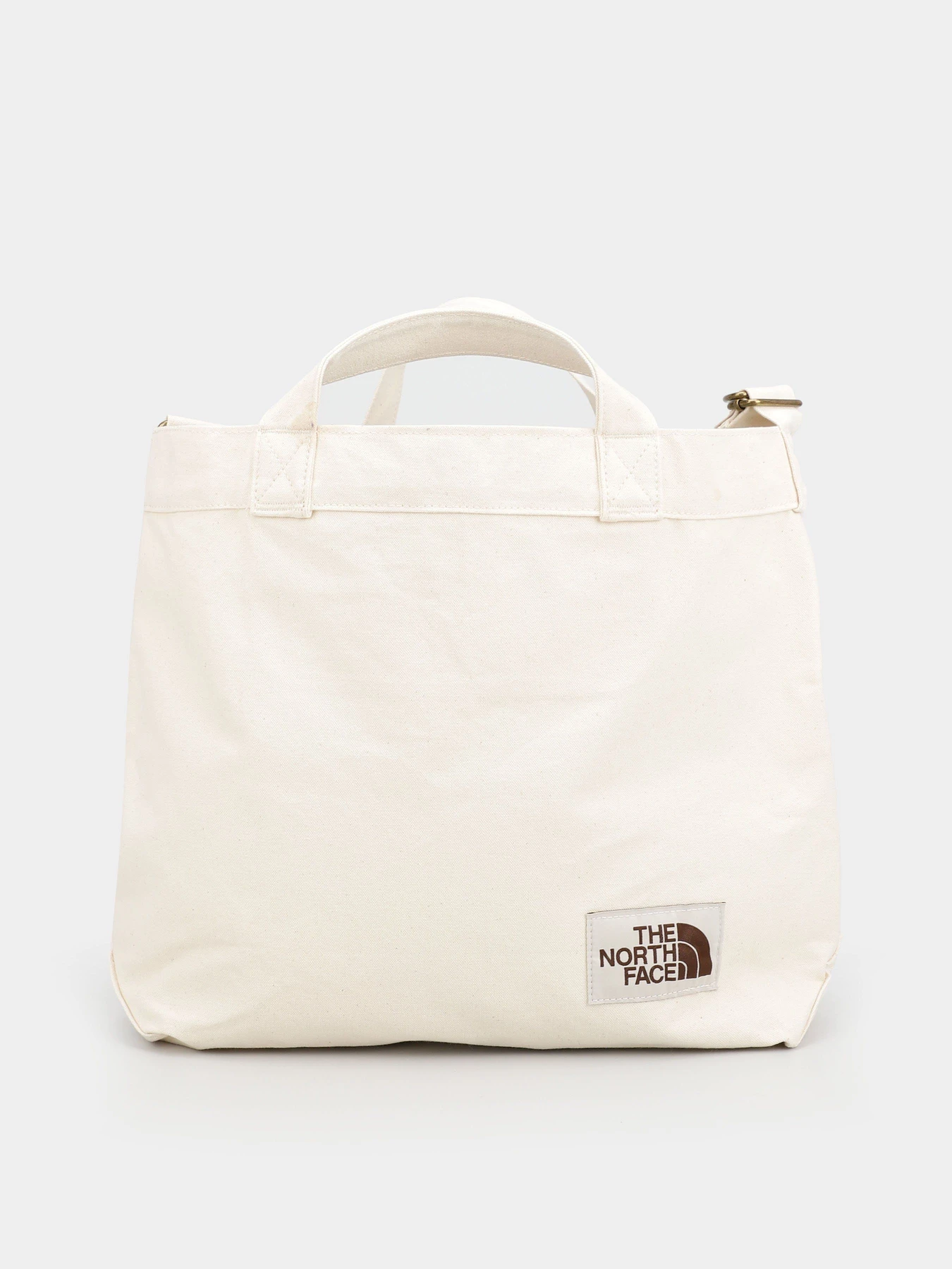 Сумки The North Face ADJUSTABLE COTTON TOTE модель NF0A81BROM71 Сумки The North Face ADJUSTABLE COTTON TOTE модель NF0A81BROM71 Фото