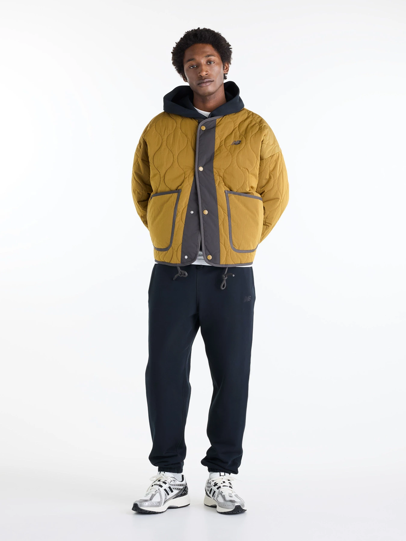 Куртки та дублянки New Balance Balance Quilted модель MJ62M2DHBRK Фото