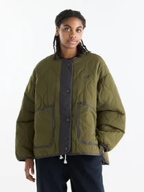 Куртки та дублянки New Balance Quilted Bomber модель WJ62P3VEAAO Фото