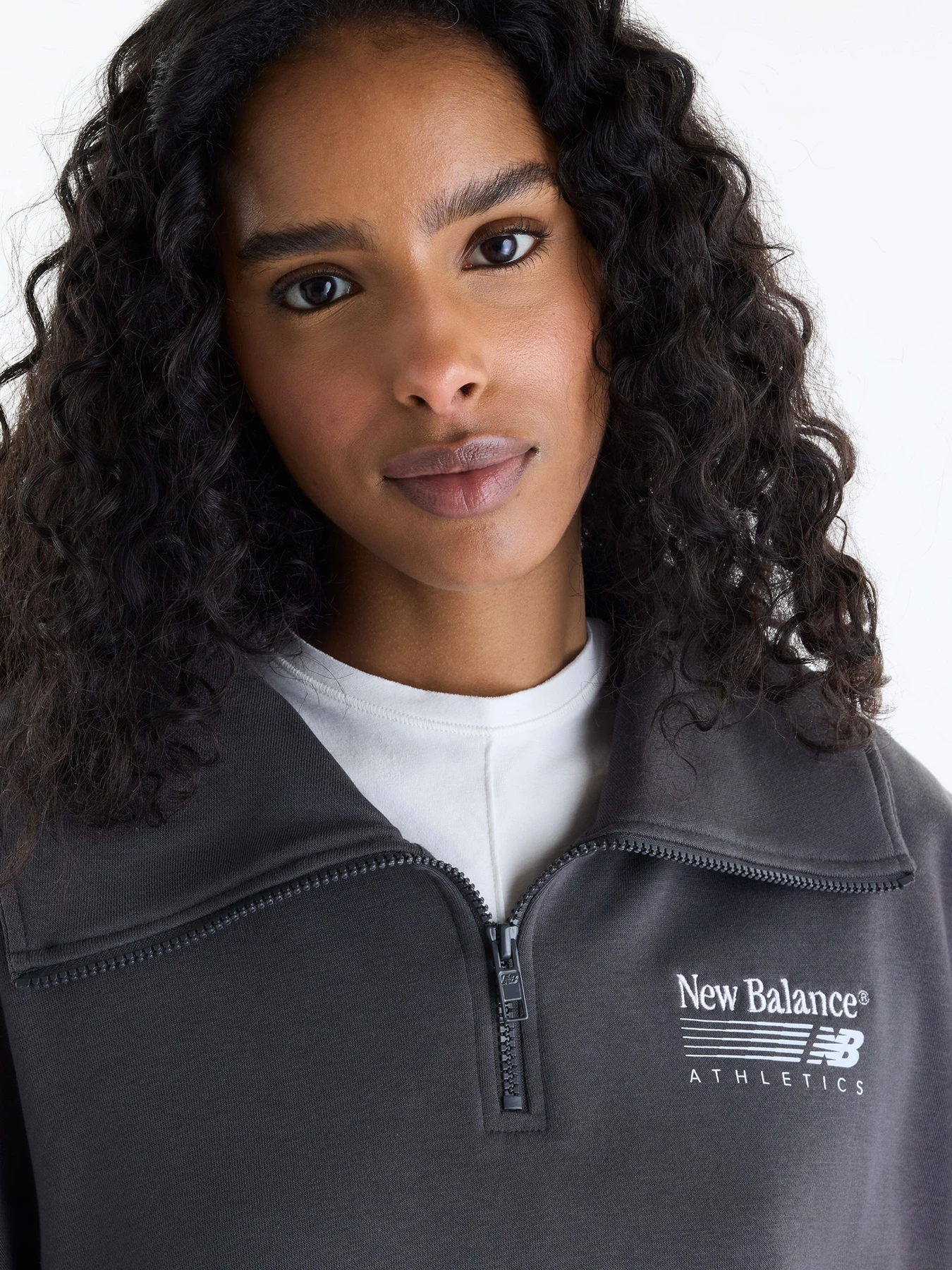 Худі та світшоти New Balance Trackside 1/2 Zip модель WT62G8VGBLK Фото