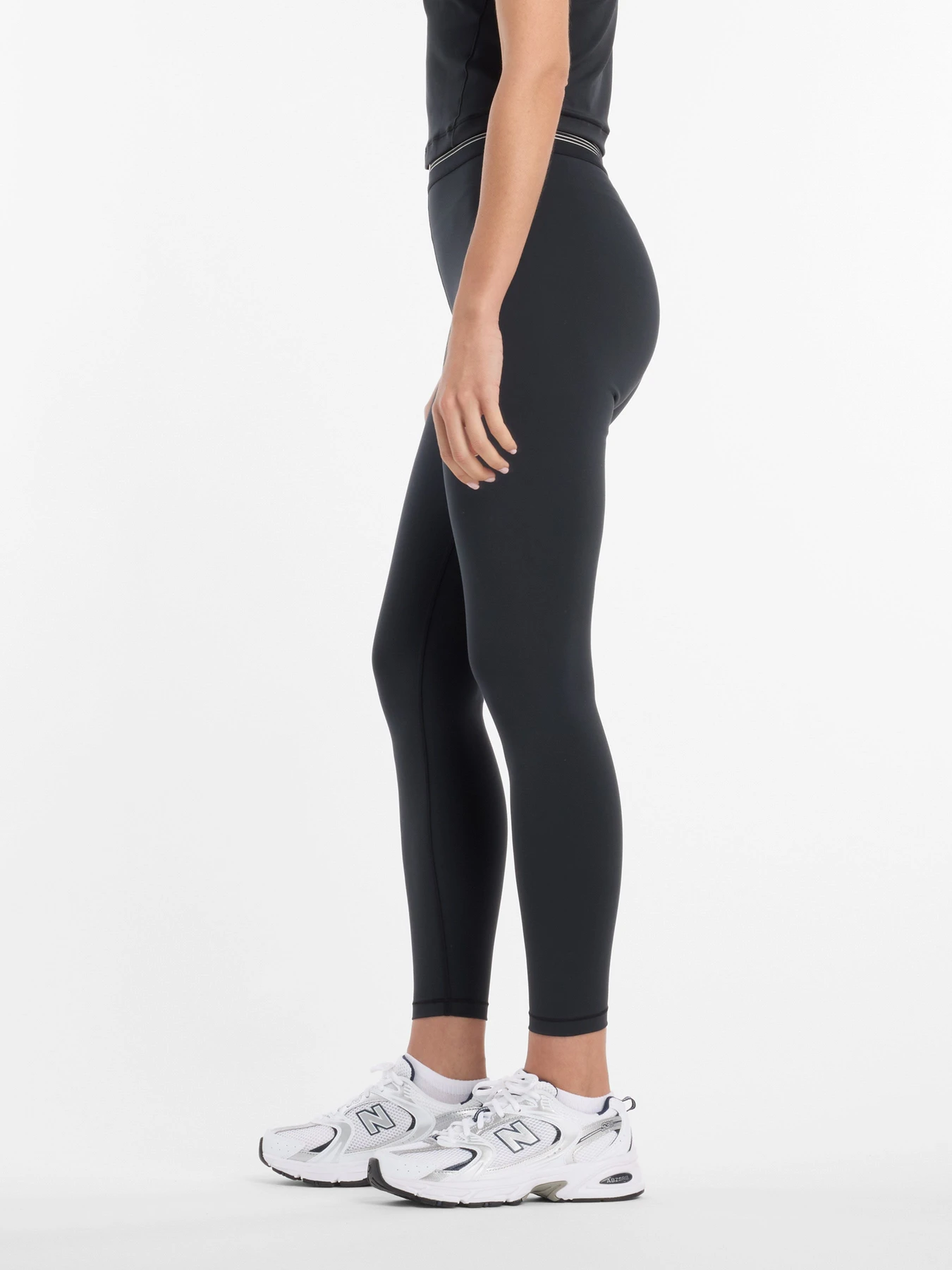 Штани New Balance AC Legging 25'' модель WB6160E1BK Штани New Balance AC Legging 25'' модель WB6160E1BK Фото