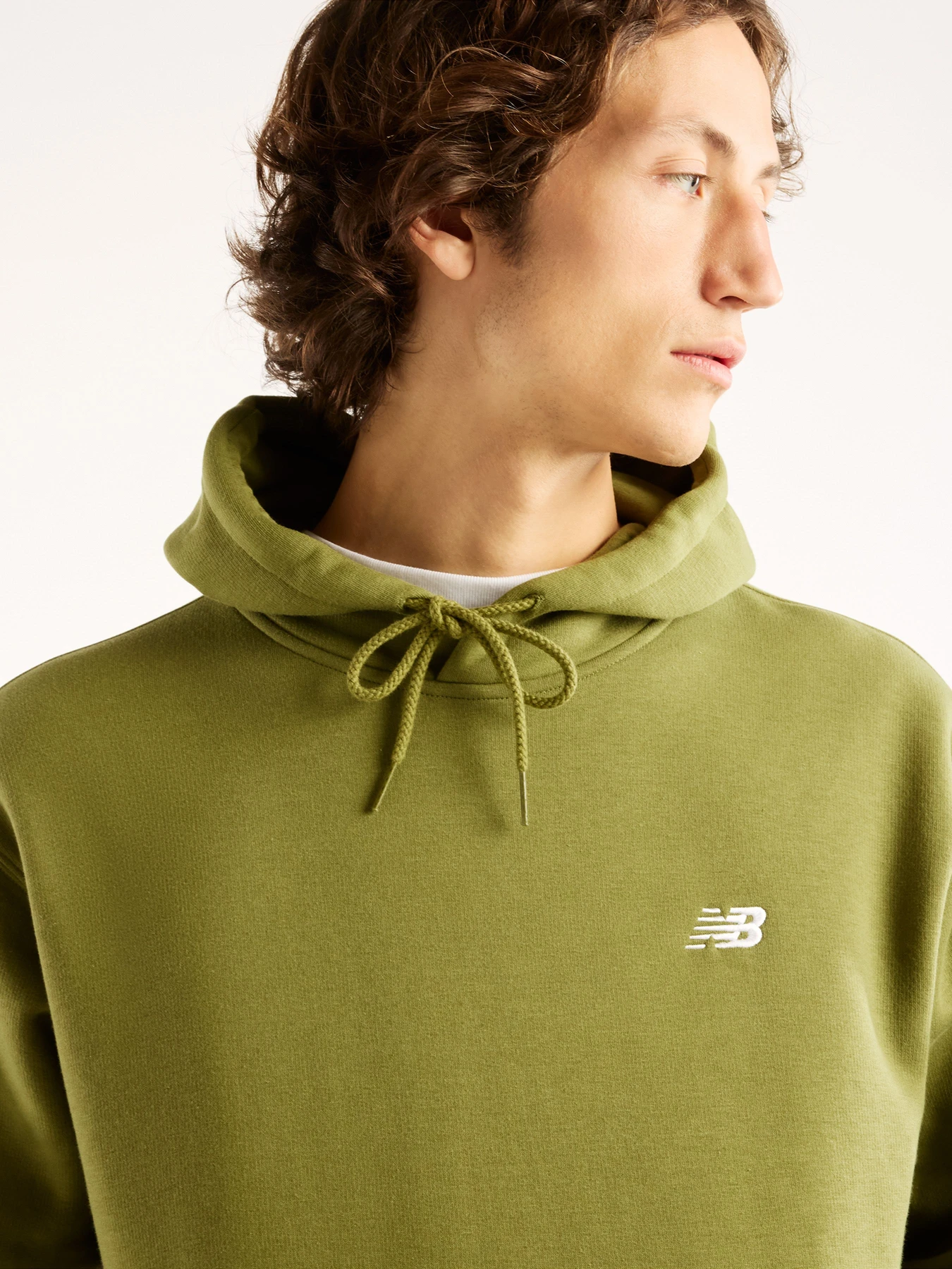 Худи и свитшоты New Balance Sport Essentials Fleece модель MT41511GEE Худи и свитшоты New Balance Sport Essentials Fleece модель MT41511GEE Фото