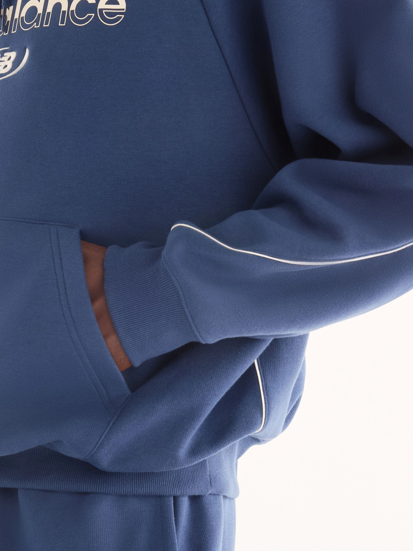 Худі та світшоти New Balance Trackside Fleece модель MT62Y14PNNY Худі та світшоти New Balance Trackside Fleece модель MT62Y14PNNY Фото