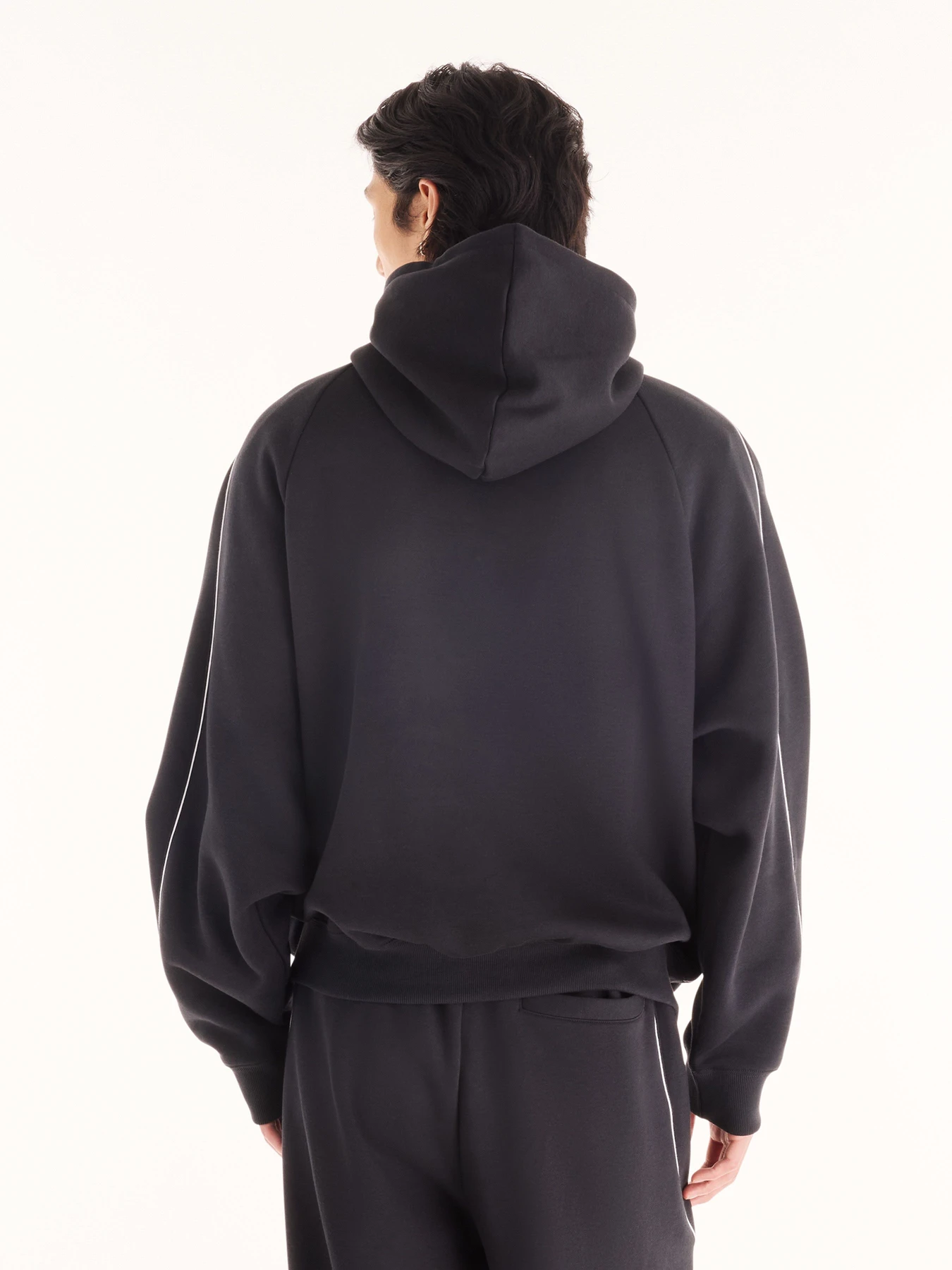 Худі та світшоти New Balance Trackside Fleece модель MT62Y14PBK Худі та світшоти New Balance Trackside Fleece модель MT62Y14PBK Фото