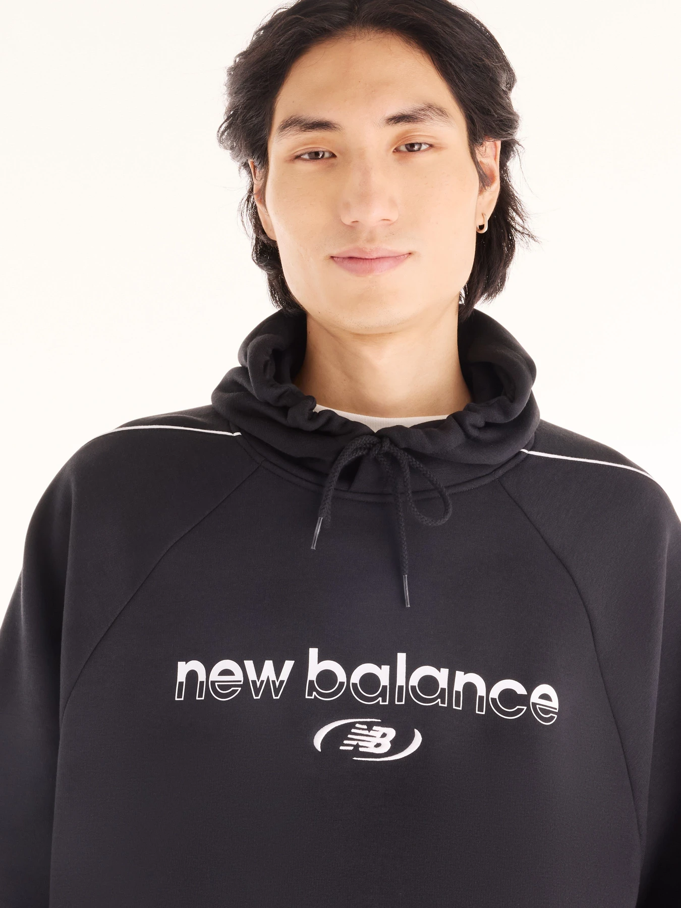 Худі та світшоти New Balance Trackside Fleece модель MT62Y14PBK Худі та світшоти New Balance Trackside Fleece модель MT62Y14PBK Фото
