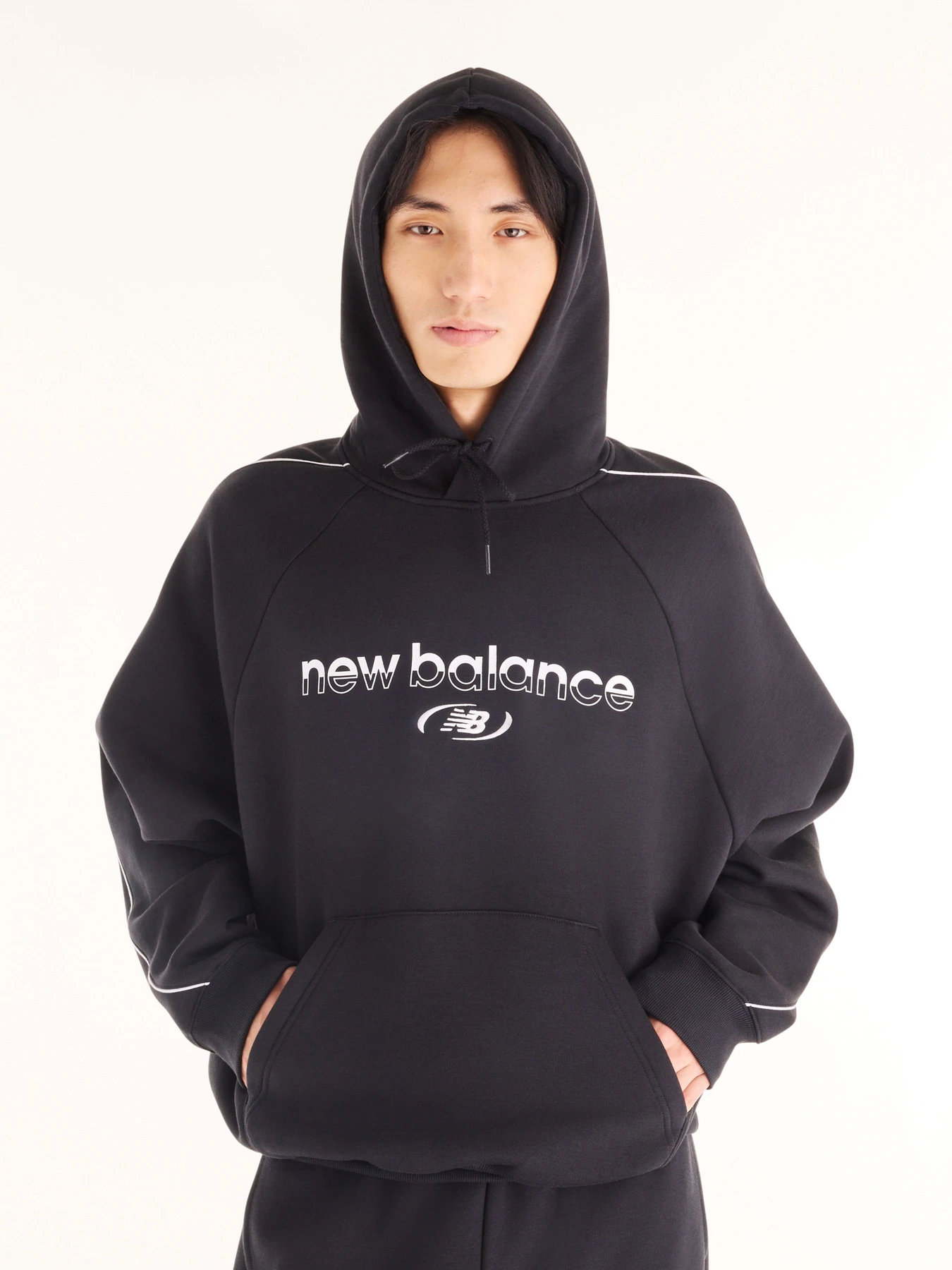 Худі та світшоти New Balance Trackside Fleece модель MT62Y14PBK Худі та світшоти New Balance Trackside Fleece модель MT62Y14PBK Фото