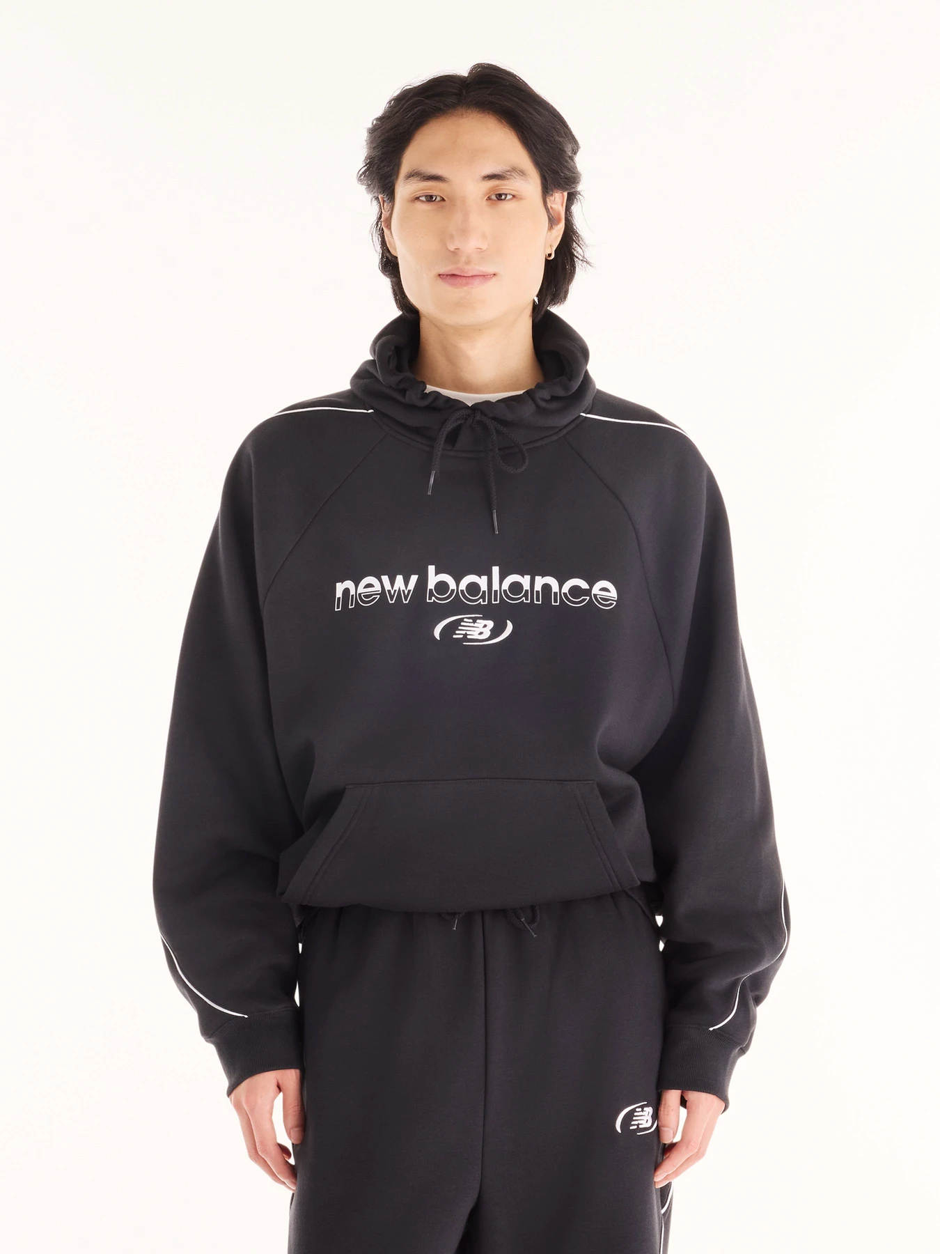 Худі та світшоти New Balance Trackside Fleece модель MT62Y14PBK Худі та світшоти New Balance Trackside Fleece модель MT62Y14PBK Фото
