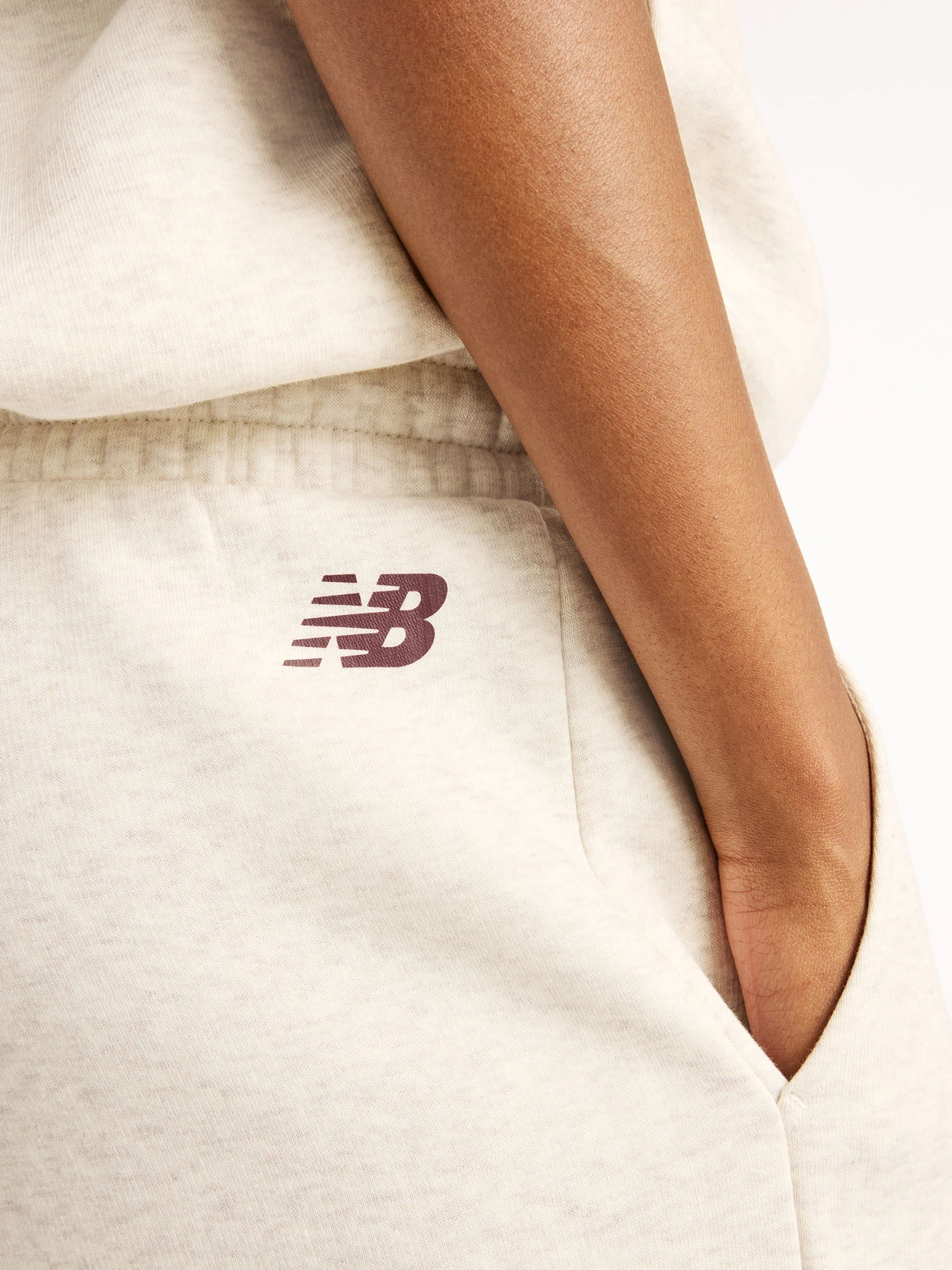 Штани New Balance Trackside Fleece модель WB62983ALIT Фото