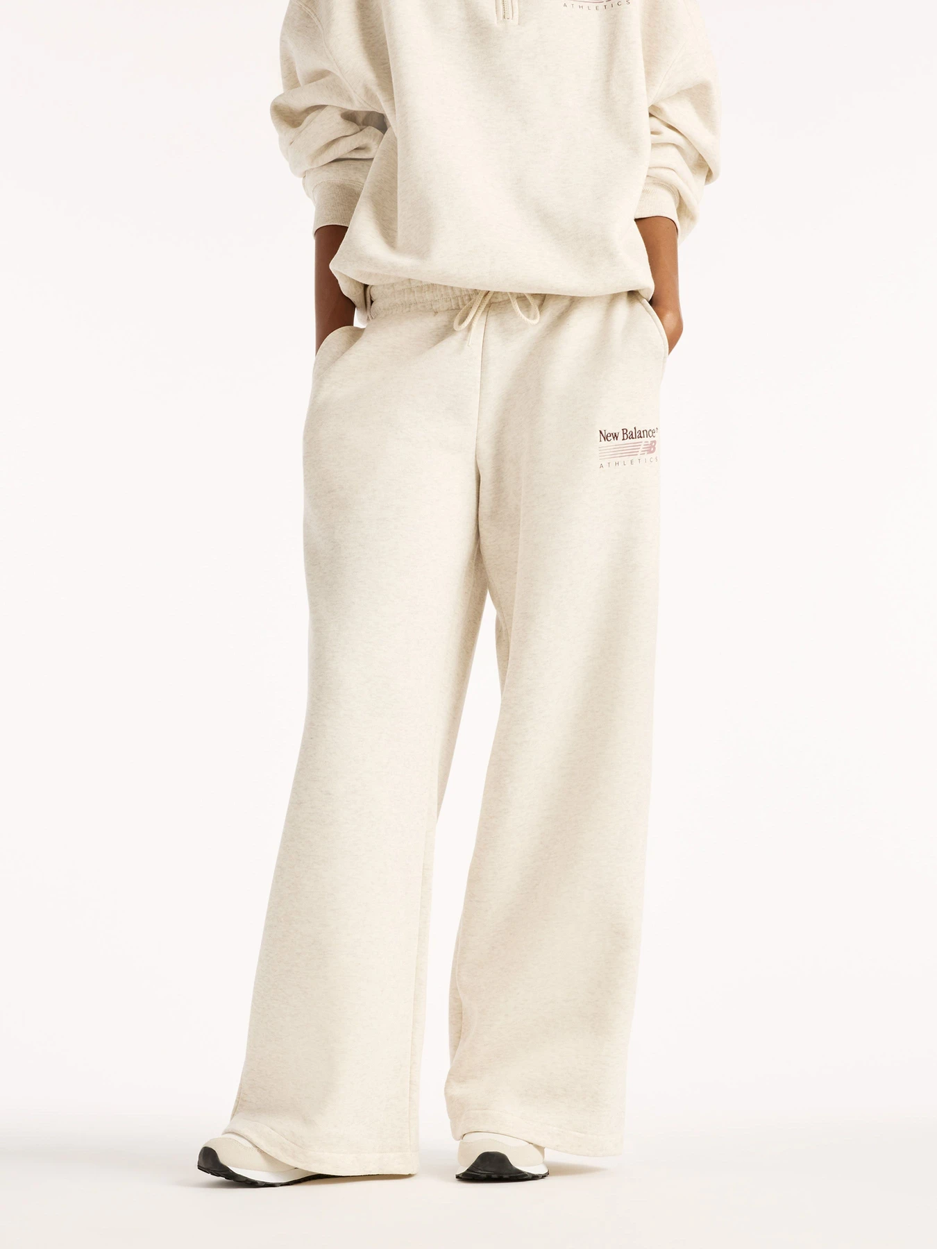 Штани New Balance Trackside Fleece модель WB62983ALIT Фото