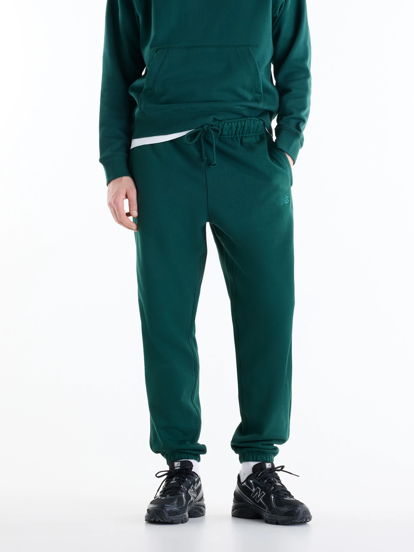Брюки New Balance модель MP41508NOG Брюки New Balance модель MP41508NOG Фото