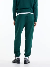 Брюки New Balance модель MP41508NOG Фото