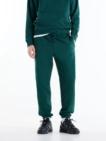 Брюки New Balance модель MP41508NOG Фото