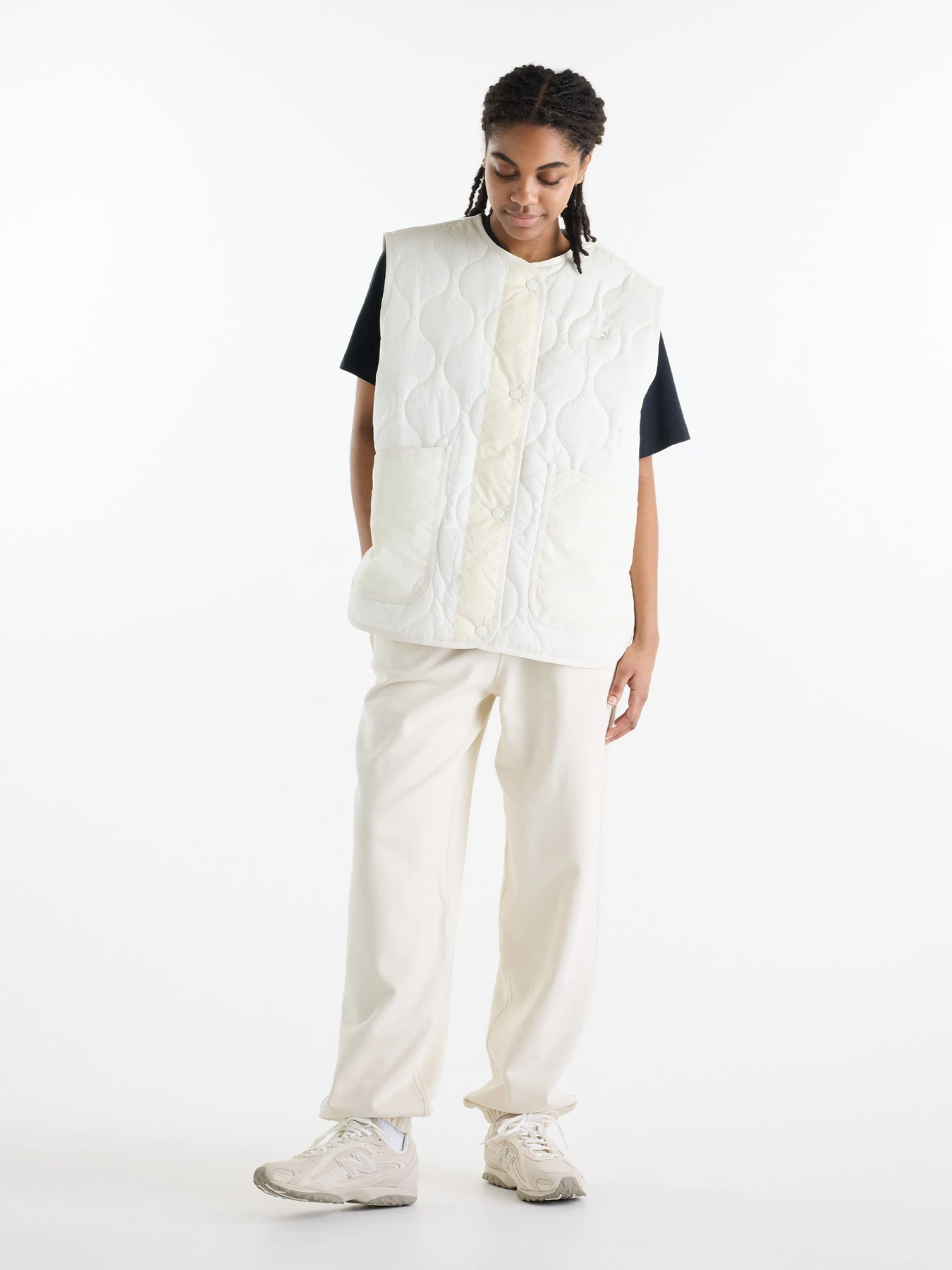 Куртки и дубленки New Balance Quilted Vest модель WJ62U33OAGA Фото