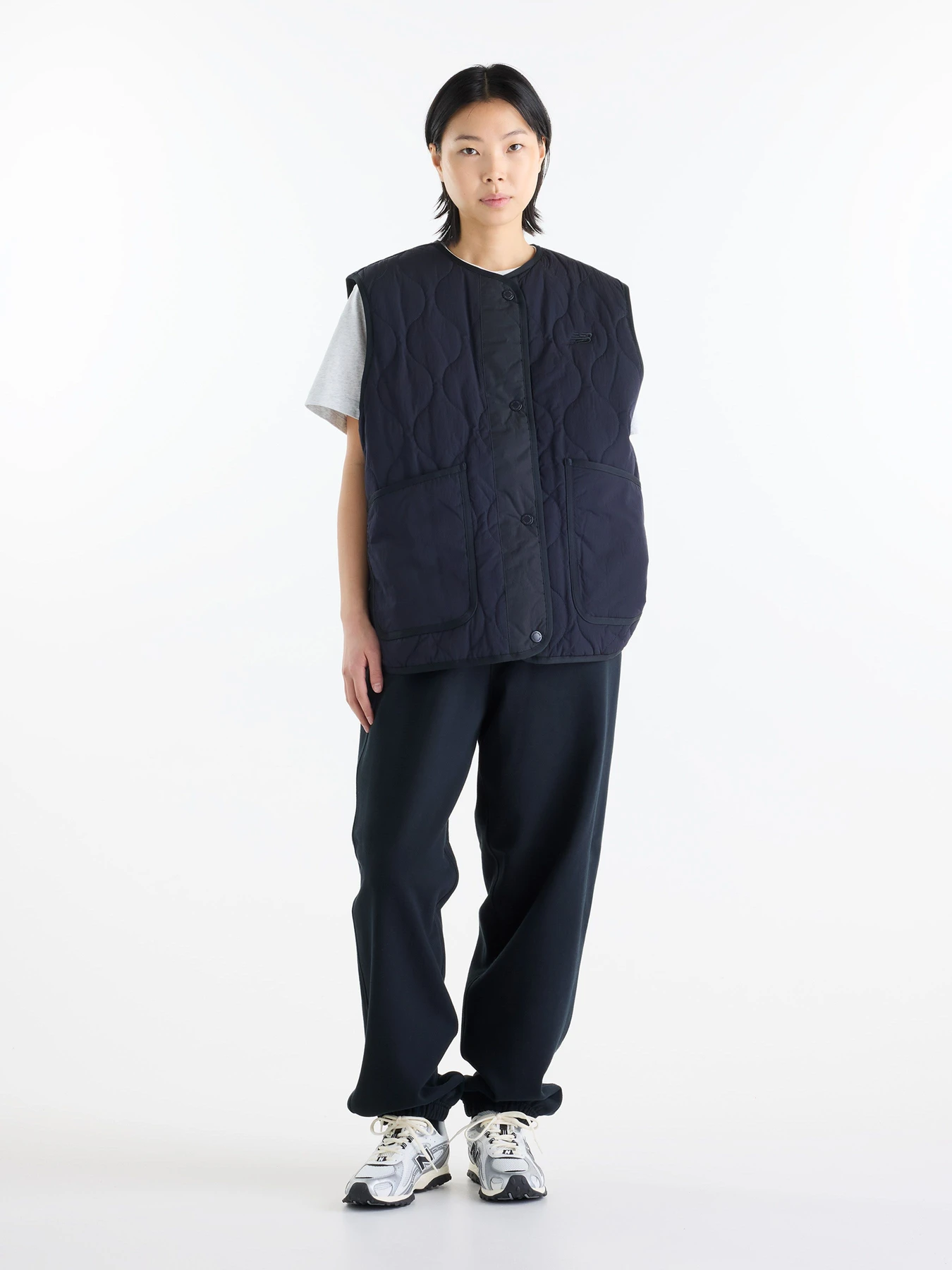 Куртки и дубленки New Balance Quilted Vest модель WJ62U33ODNT Куртки и дубленки New Balance Quilted Vest модель WJ62U33ODNT Фото