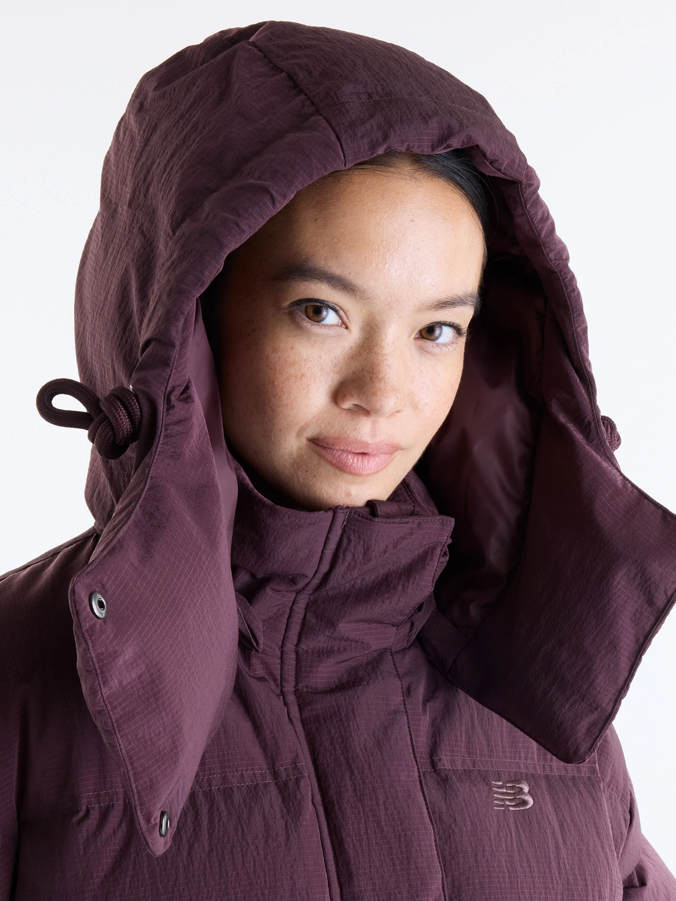 Куртки и дубленки New Balance Premium Puffer модель WJ6268B9YLR Куртки и дубленки New Balance Premium Puffer модель WJ6268B9YLR Фото