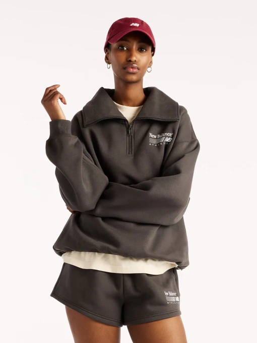 Худі та світшоти New Balance Trackside Fleece Half Zip модель WT62W1XDBLK Фото