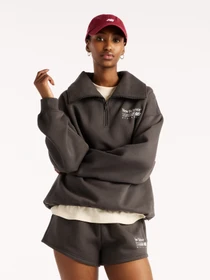 Худі та світшоти New Balance Trackside Fleece Half Zip модель WT62W1XDBLK Фото