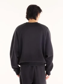 Худі та світшоти New Balance Trackside Fleece Crew модель MT6255WPBK Фото