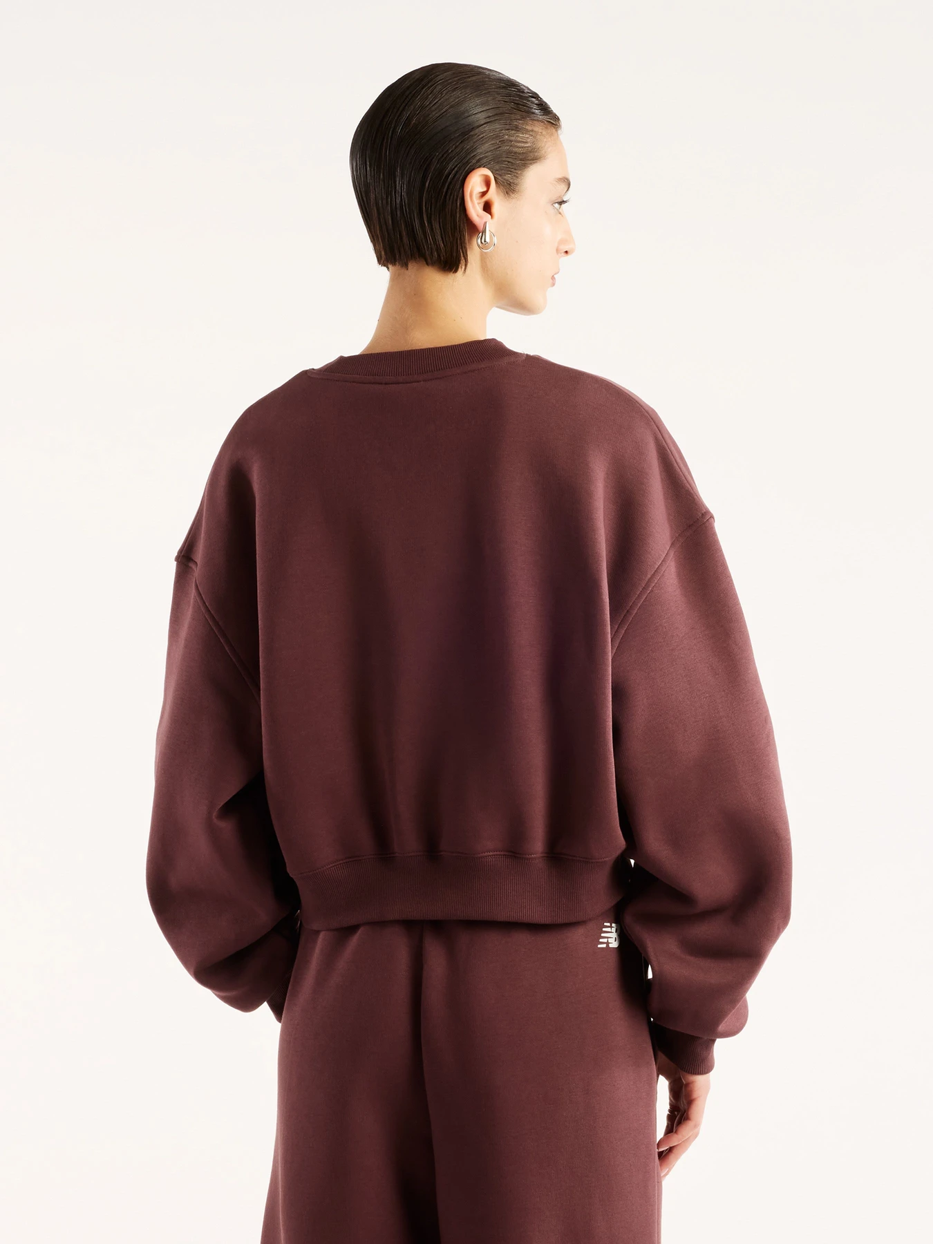 Худи и свитшоты New Balance Trackside Fleece Crew модель WT62T7JOYLR Фото