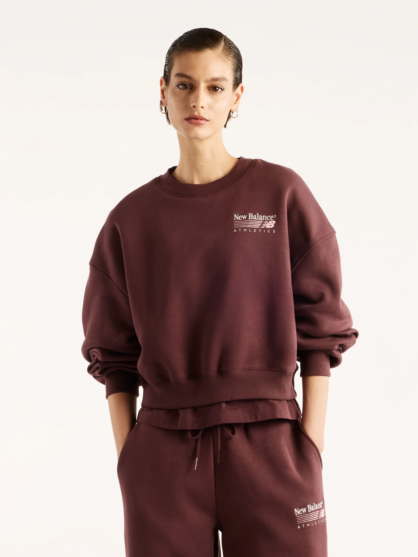 Худи и свитшоты New Balance Trackside Fleece Crew модель WT62T7JOYLR Фото