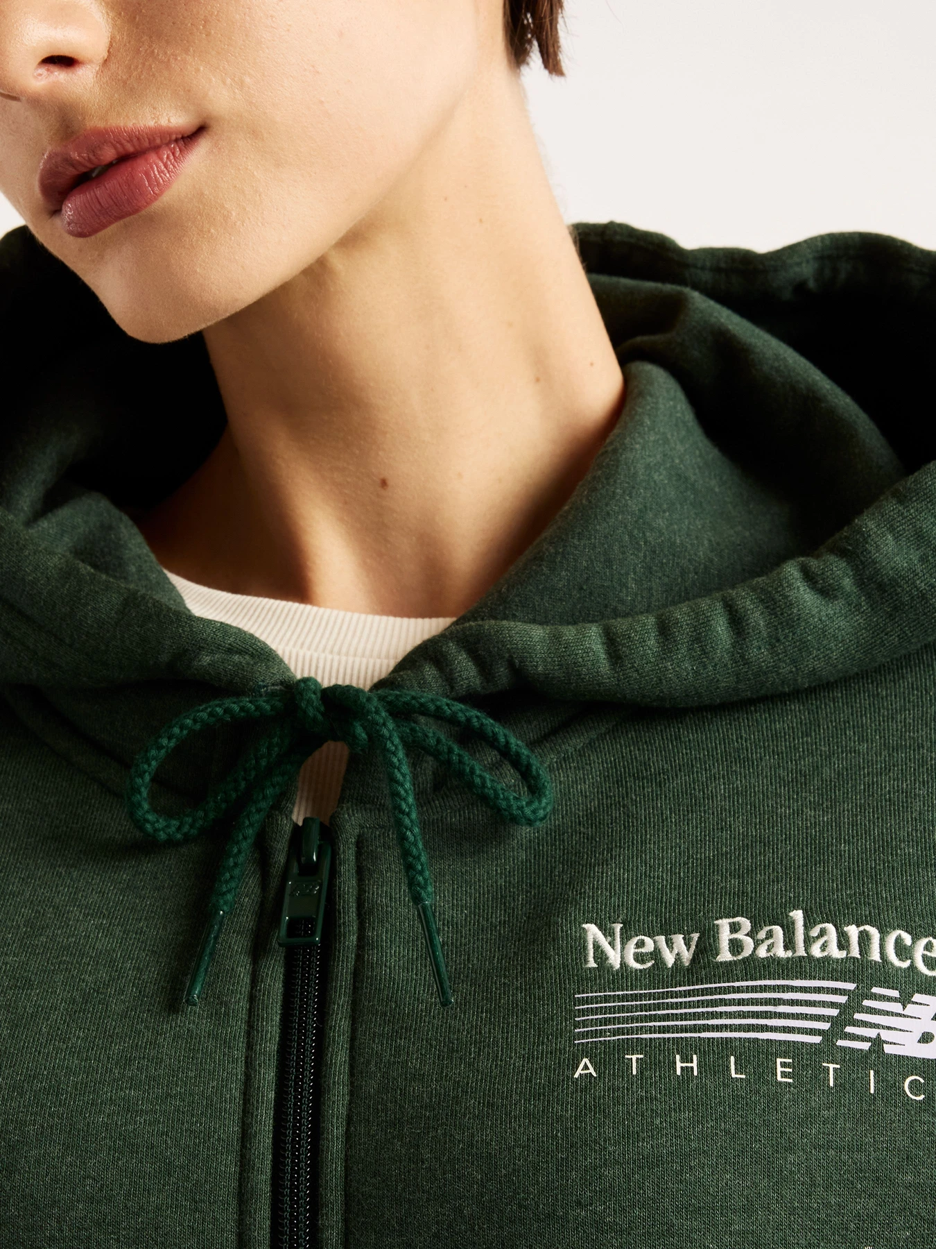 Худи и свитшоты New Balance Trackside Fleece Full Zip модель WJ62P2UPNDG Худи и свитшоты New Balance Trackside Fleece Full Zip модель WJ62P2UPNDG Фото