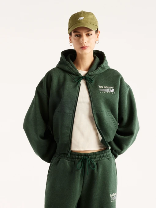 Худі та світшоти New Balance Trackside Fleece Full Zip модель WJ62P2UPNDG Фото