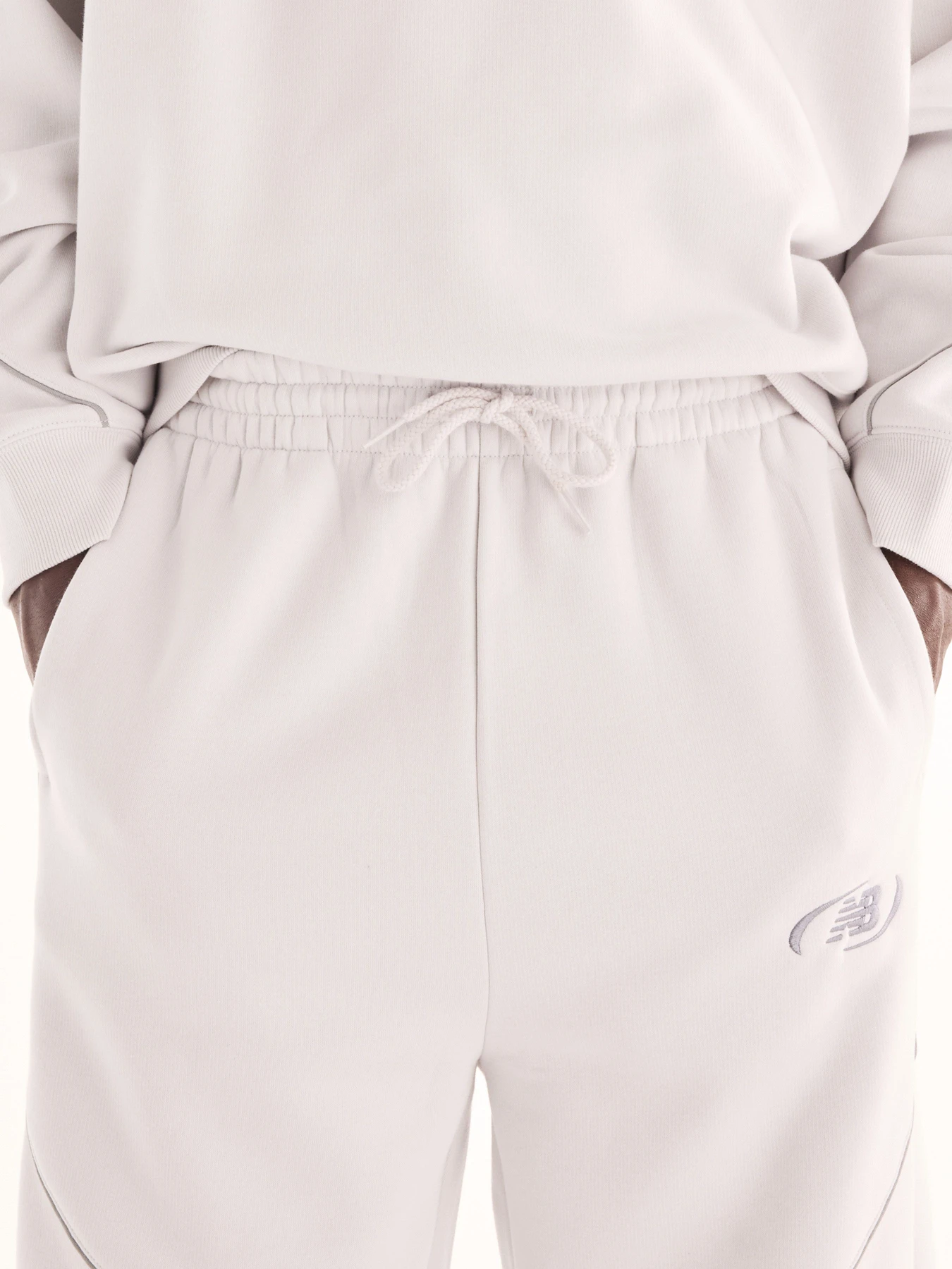Брюки New Balance Trackside Fleece модель MB62G6ZVGYM Брюки New Balance Trackside Fleece модель MB62G6ZVGYM Фото