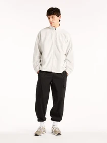 Куртки и дубленки New Balance модель MJ53507GYM Фото