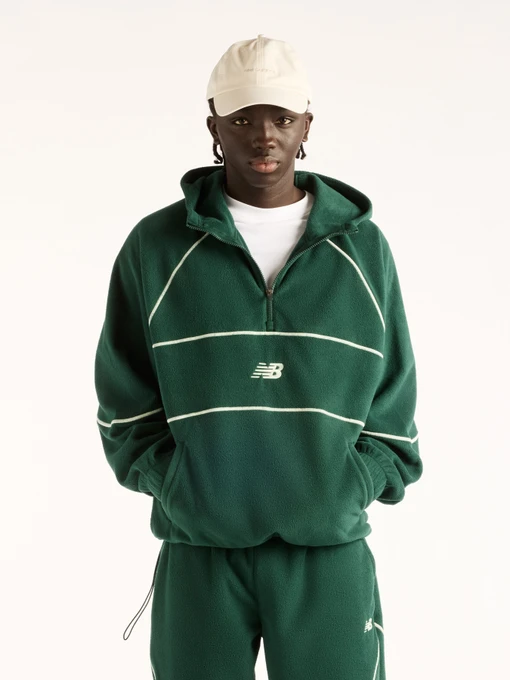 Худі та світшоти New Balance Trackside Polar Fleece модель MT62N1TYNOG Фото