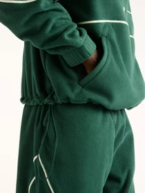 Худи и свитшоты New Balance Trackside Polar Fleece модель MT62N1TYNOG Фото