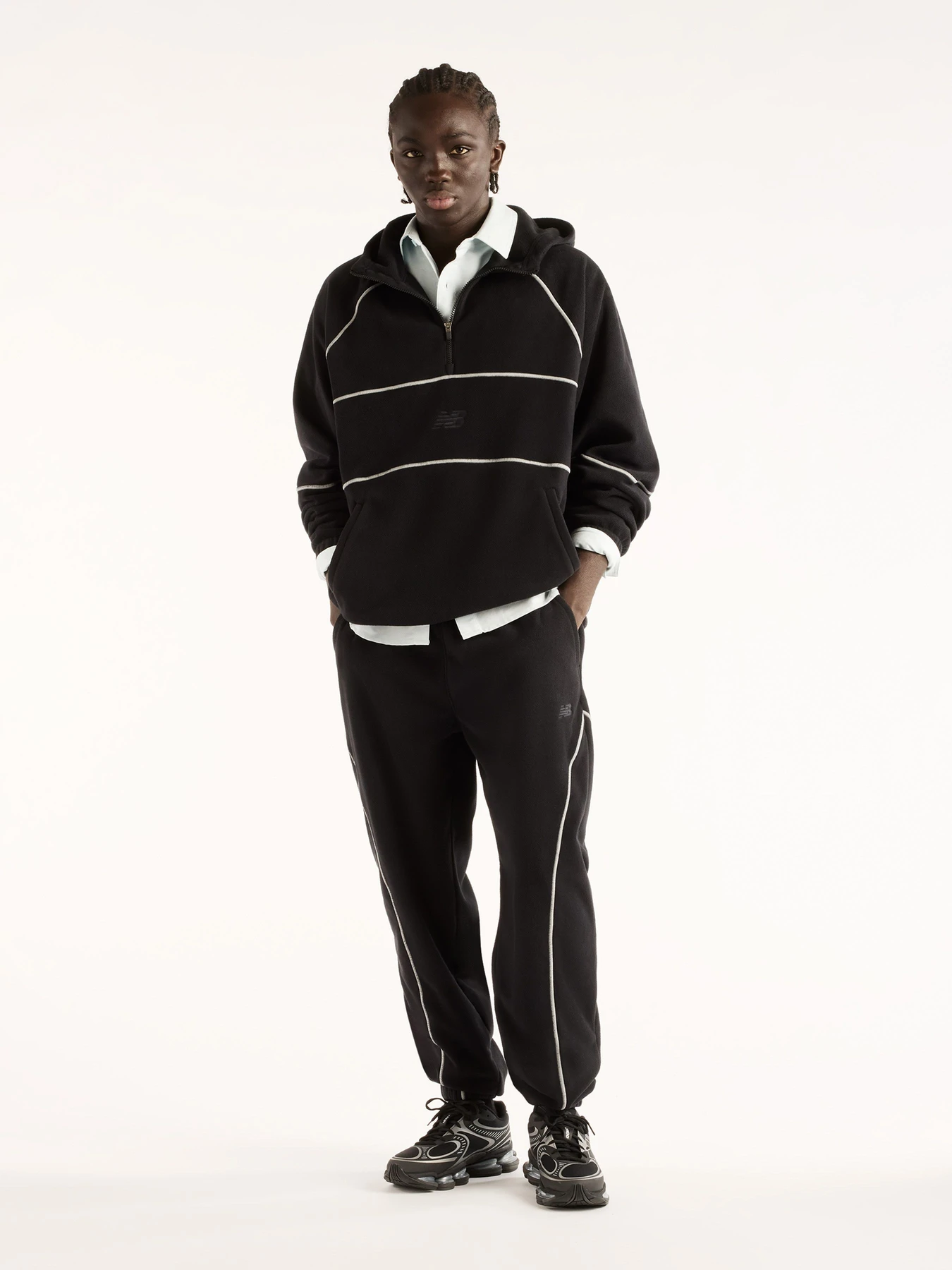 Худі та світшоти New Balance Trackside Polar Fleece модель MT62N1TYBK Фото