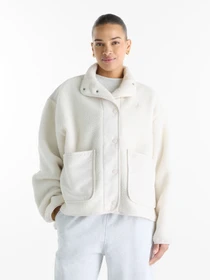 Куртки та дублянки New Balance High Pile Fleece модель WJ62Q8YDLIN Фото
