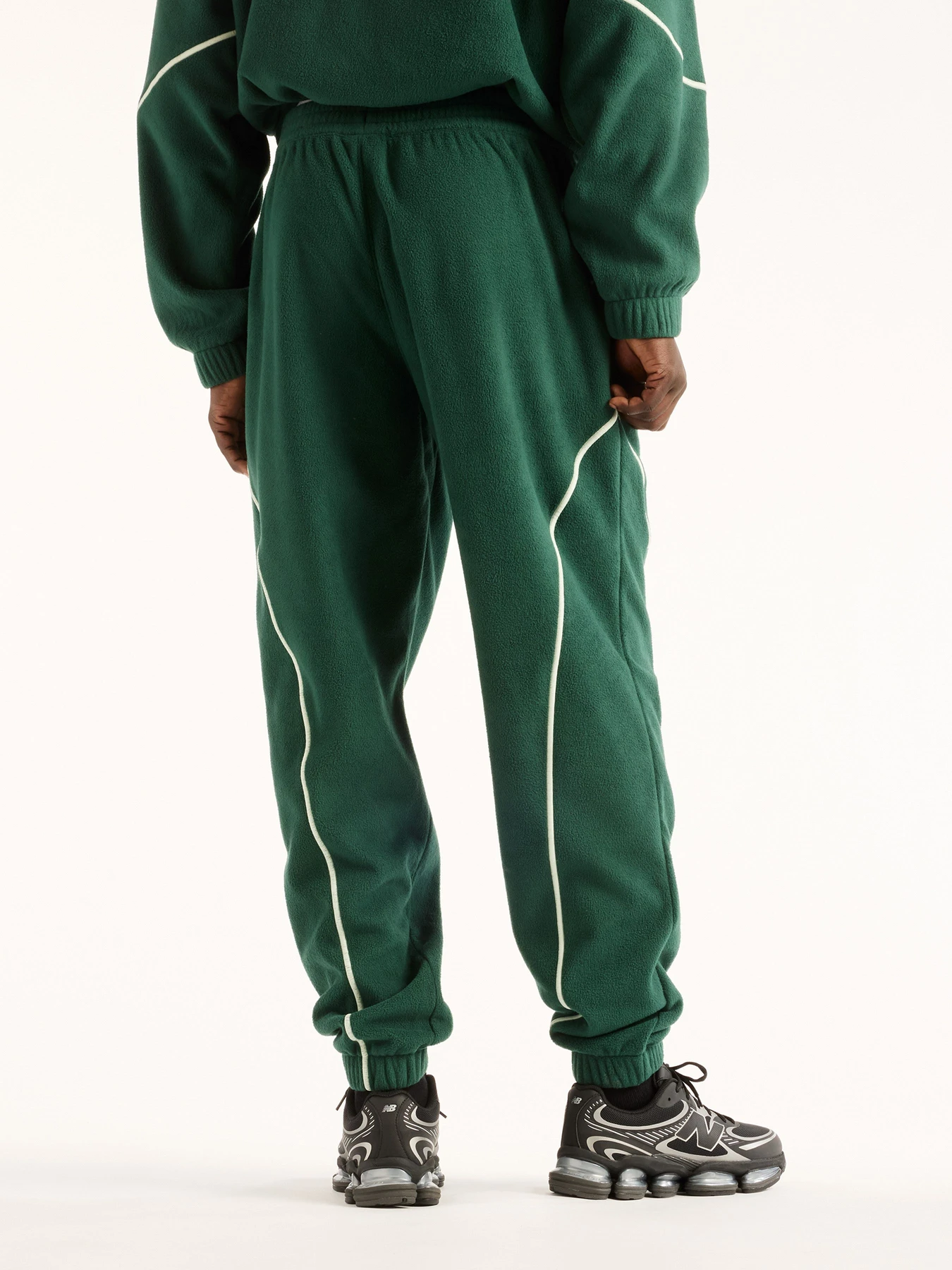 Брюки New Balance Trackside Polar Fleece модель MB62H07MNOG Брюки New Balance Trackside Polar Fleece модель MB62H07MNOG Фото