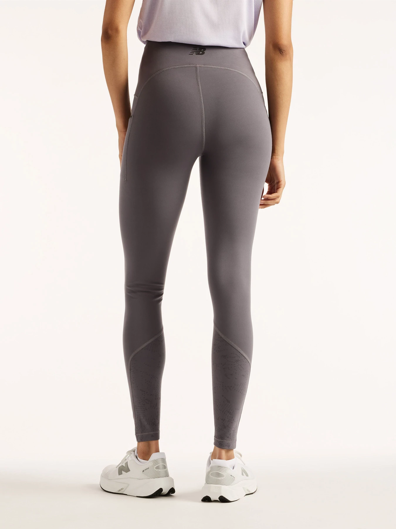 Брюки New Balance Reflective RC Heat Legging 27'' модель WB6239K1AA9 Брюки New Balance Reflective RC Heat Legging 27'' модель WB6239K1AA9 Фото