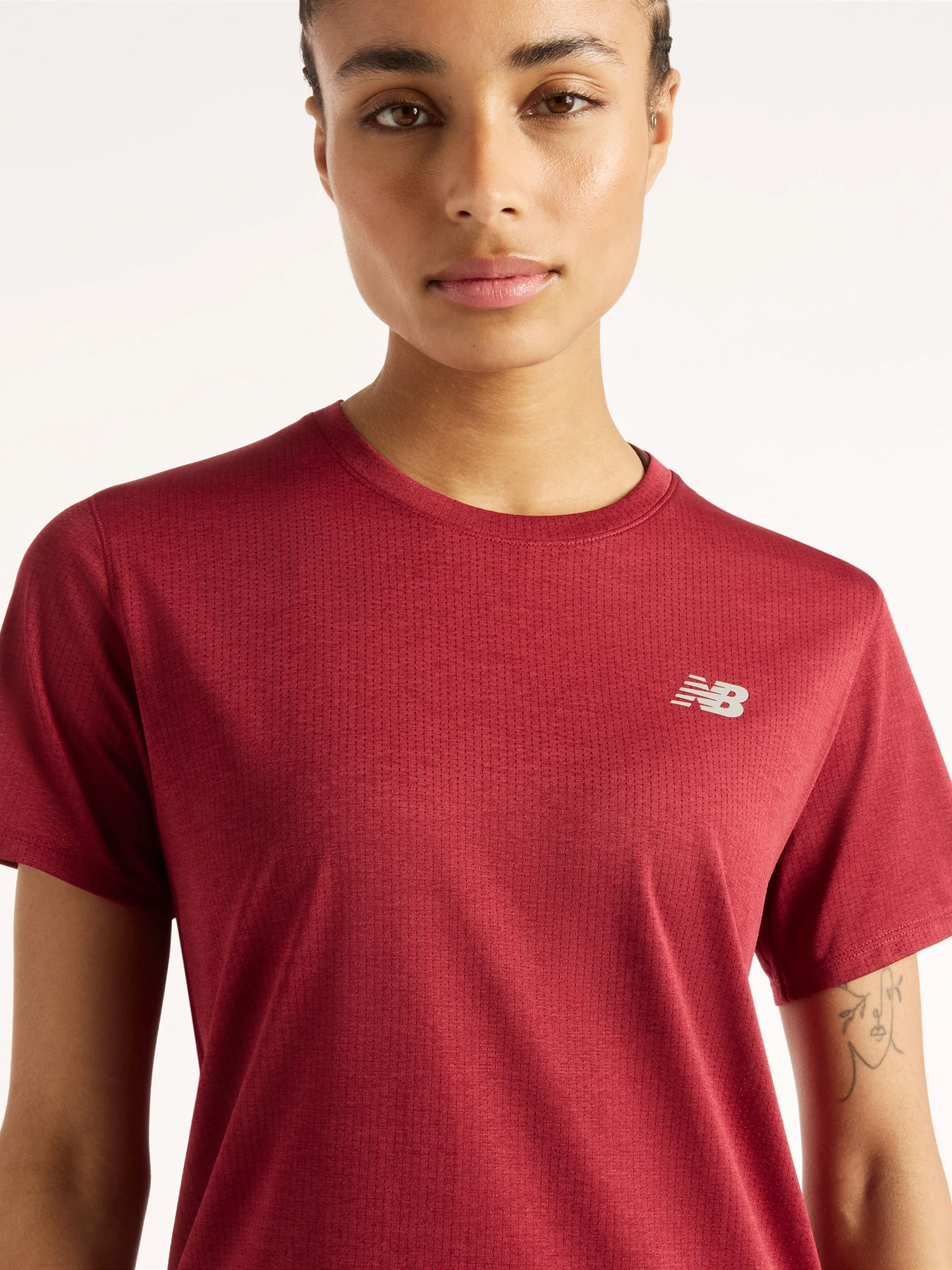 Футболки і поло New Balance RC Essential модель WT41253PDR Футболки і поло New Balance RC Essential модель WT41253PDR Фото