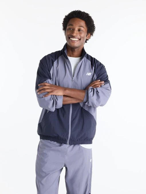 Куртки та дублянки New Balance Sport Legacy модель MJ61J73YAA9 Фото