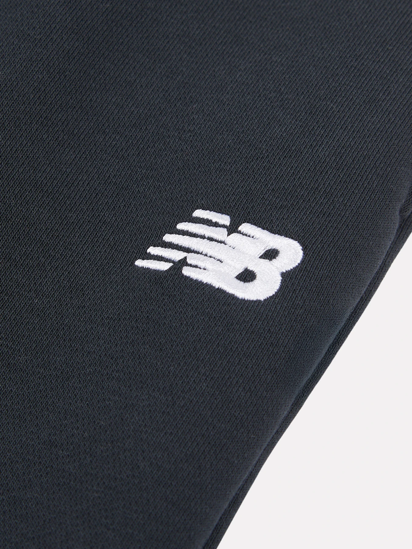 Штани New Balance Small Logo Wide Leg модель YB6252HMBK Штани New Balance Small Logo Wide Leg модель YB6252HMBK Фото