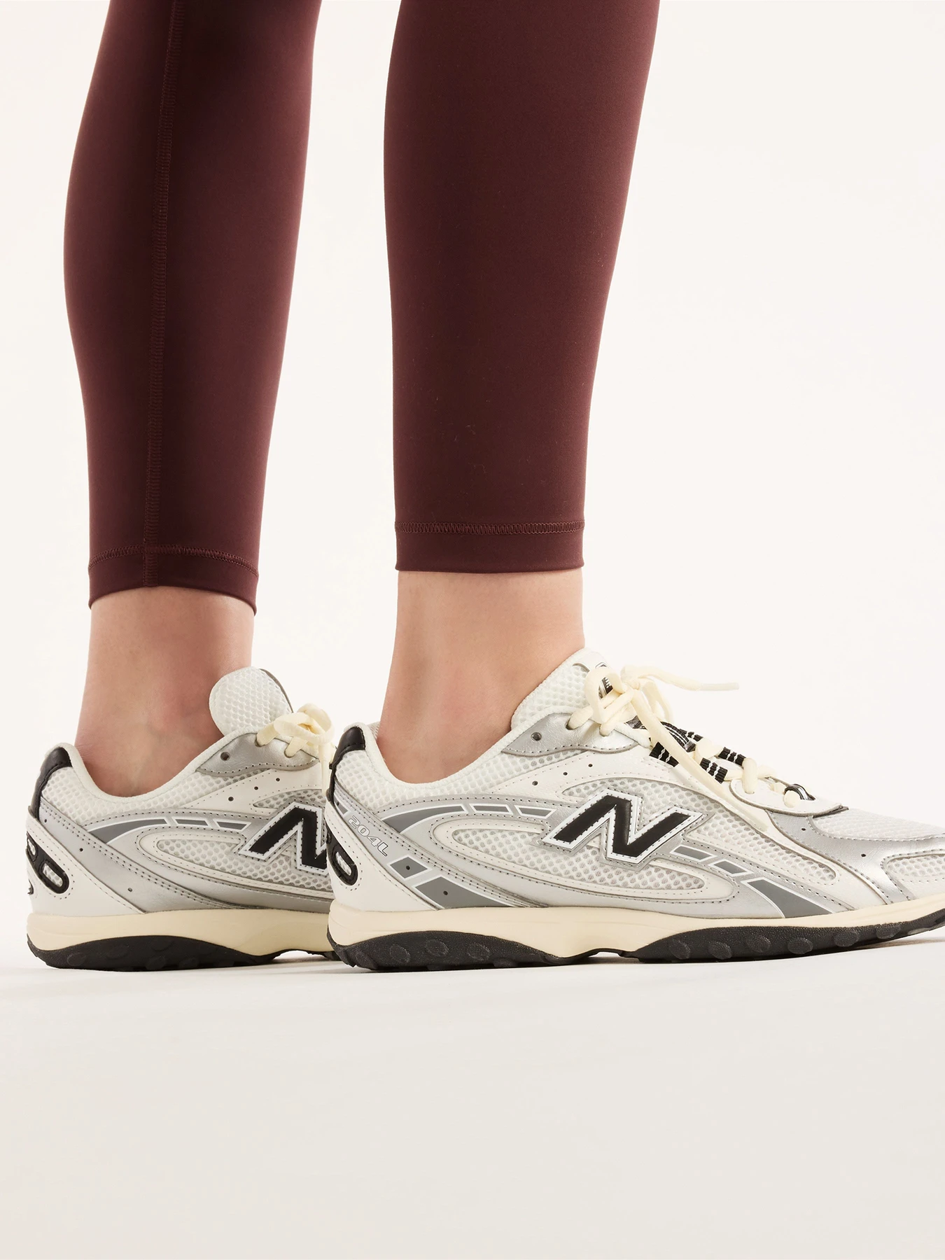 Штани New Balance AC Legging 25'' модель WB6160E1YLR Штани New Balance AC Legging 25'' модель WB6160E1YLR Фото