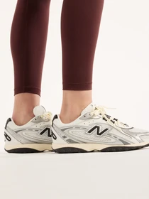 Штани New Balance AC Legging 25'' модель WB6160E1YLR Фото