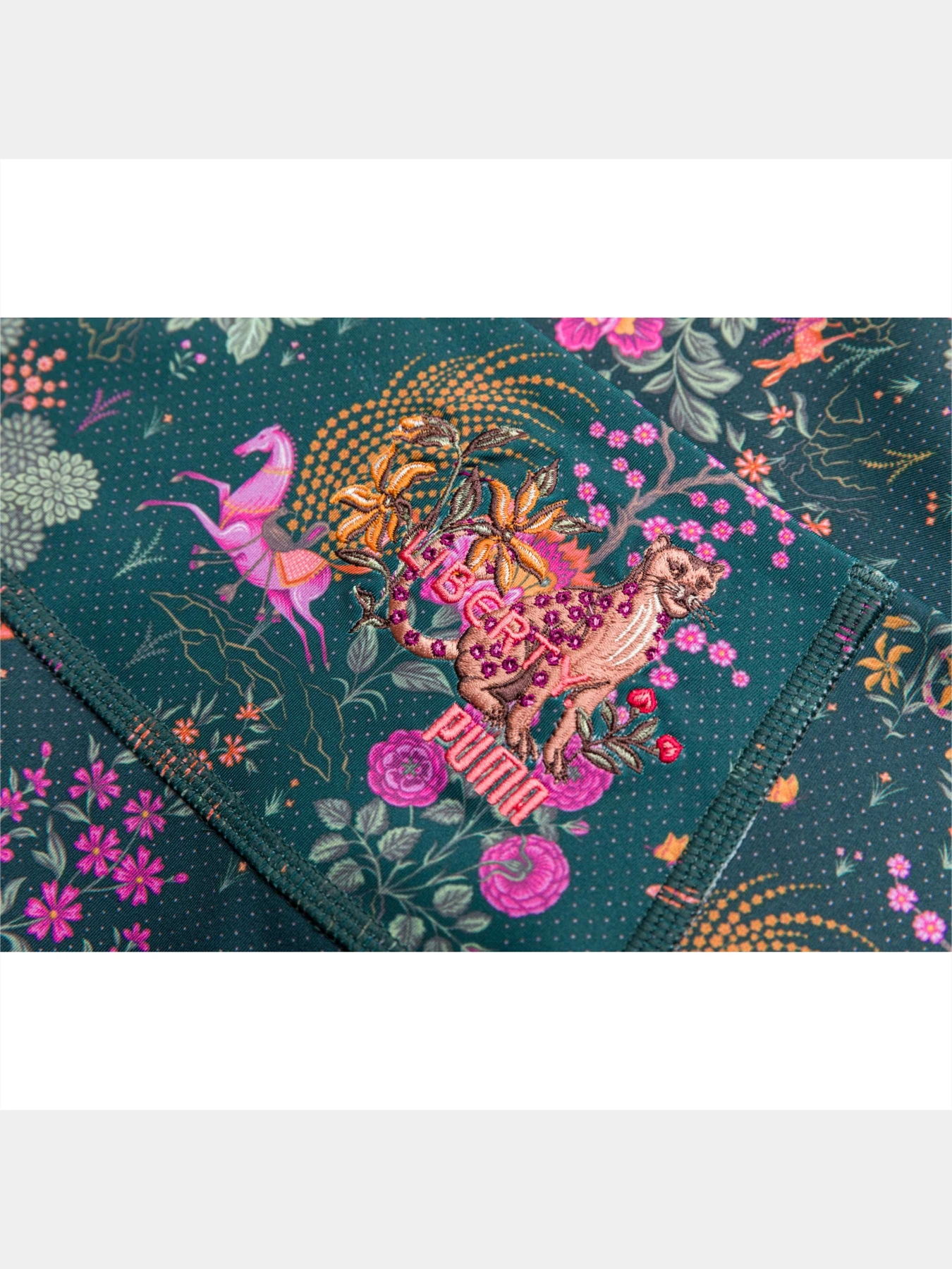 Штани PUMA Liberty Forever Luxe Tight модель 521191 Фото