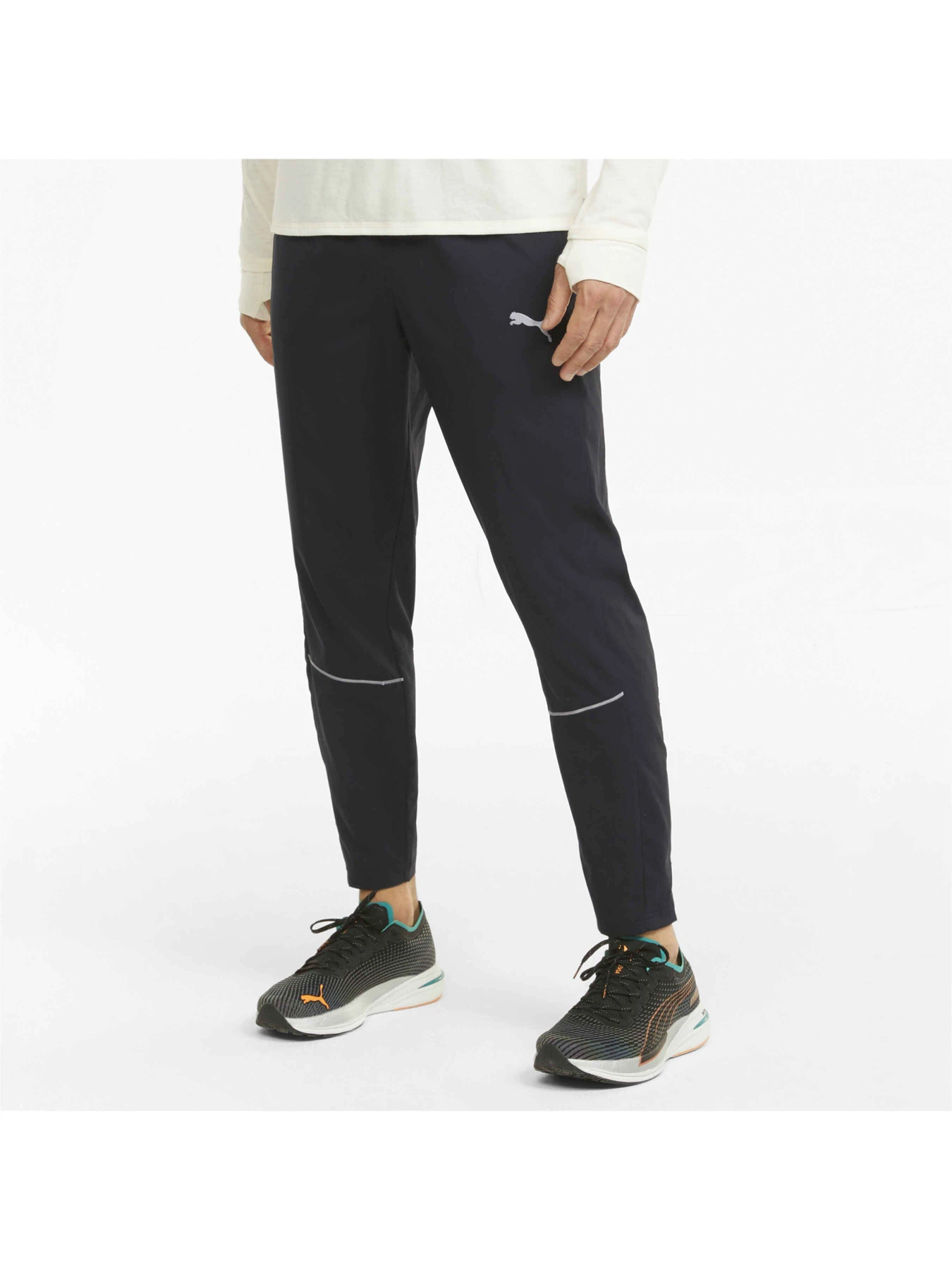 Брюки PUMA Run Tapered Pant M модель 520858 Брюки PUMA Run Tapered Pant M модель 520858 Фото