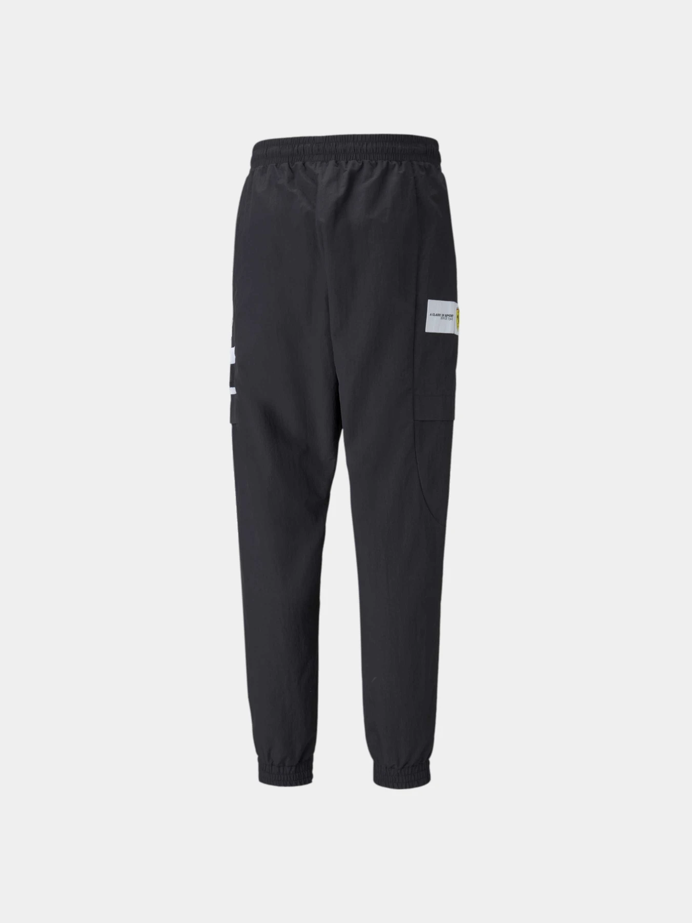 Брюки PUMA Ferrari Race Stmnt Woven Pnt модель 531646 Фото