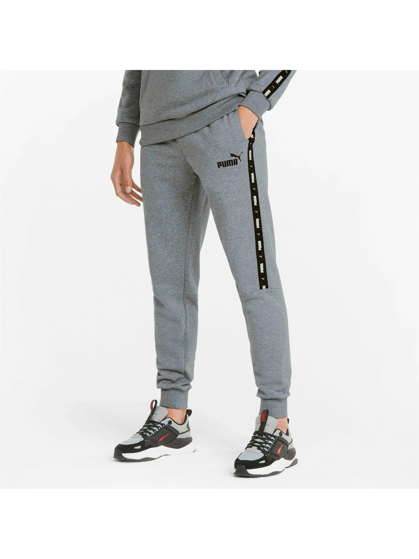 Брюки PUMA Ess+ Tape Sweatpants модель 847388 Брюки PUMA Ess+ Tape Sweatpants модель 847388 Фото