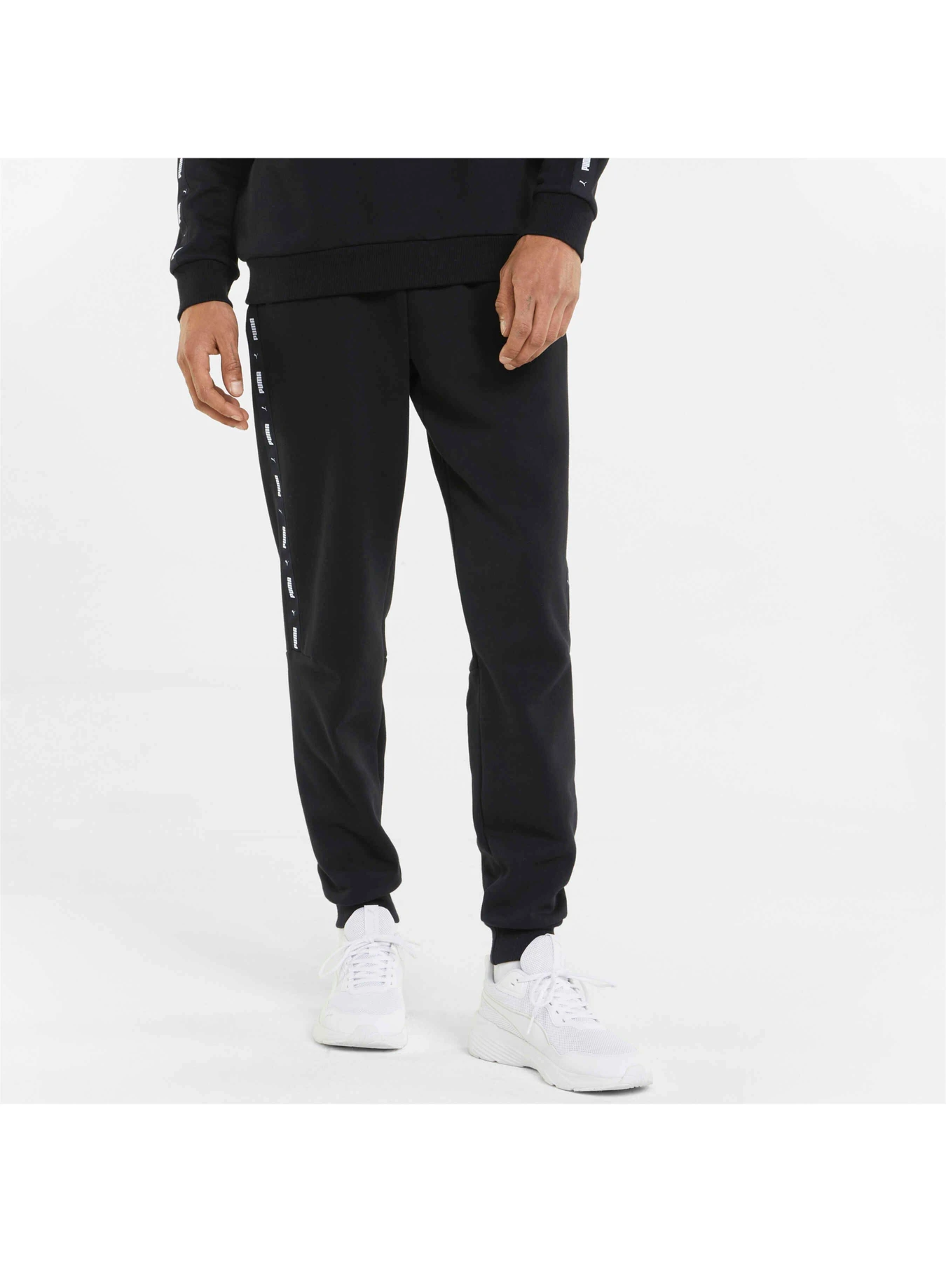 Брюки PUMA Ess+ Tape Sweatpants модель 849042 Брюки PUMA Ess+ Tape Sweatpants модель 849042 Фото
