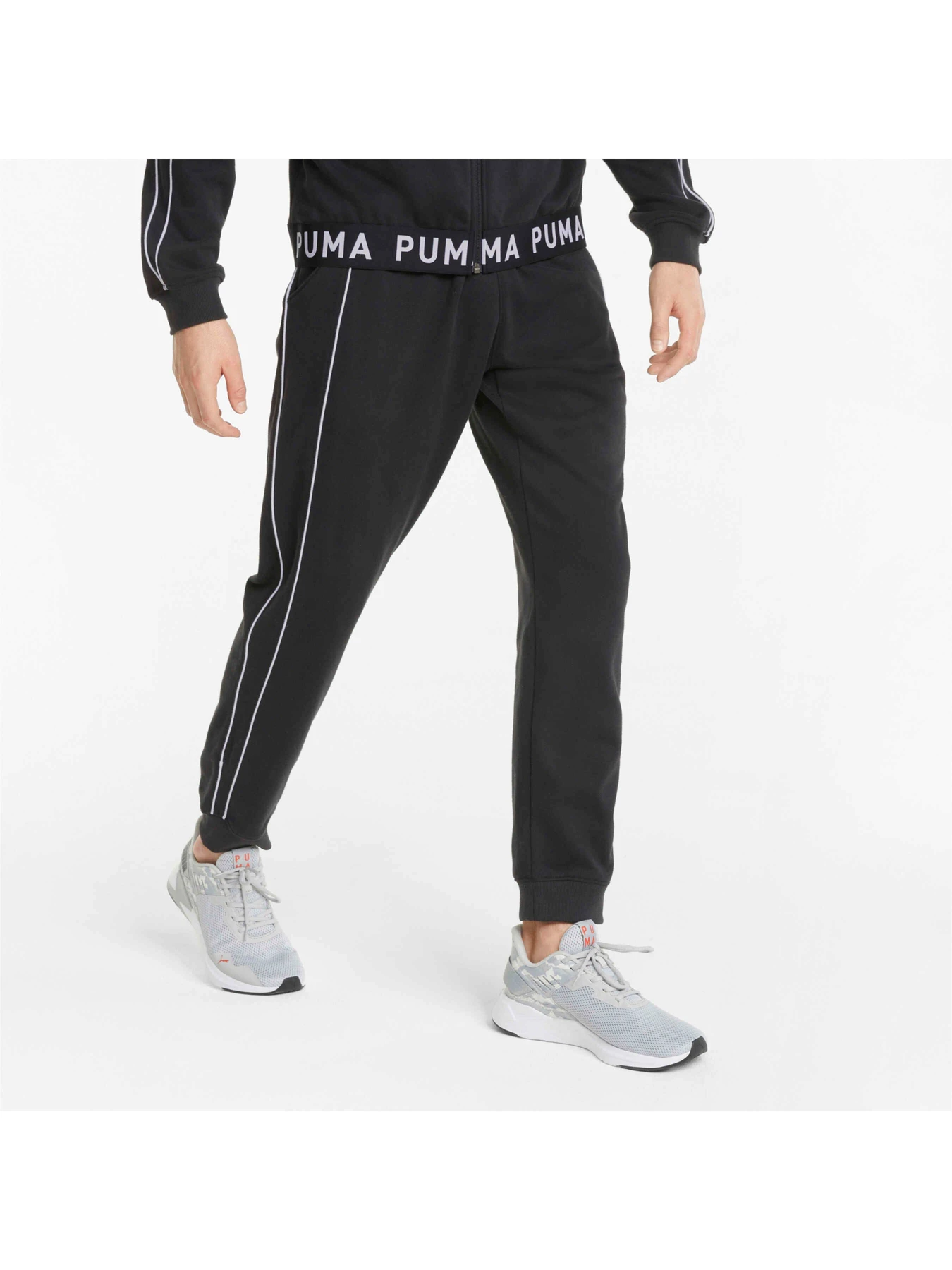 Штани PUMA Train Knit Jogger модель 521837 Штани PUMA Train Knit Jogger модель 521837 Фото