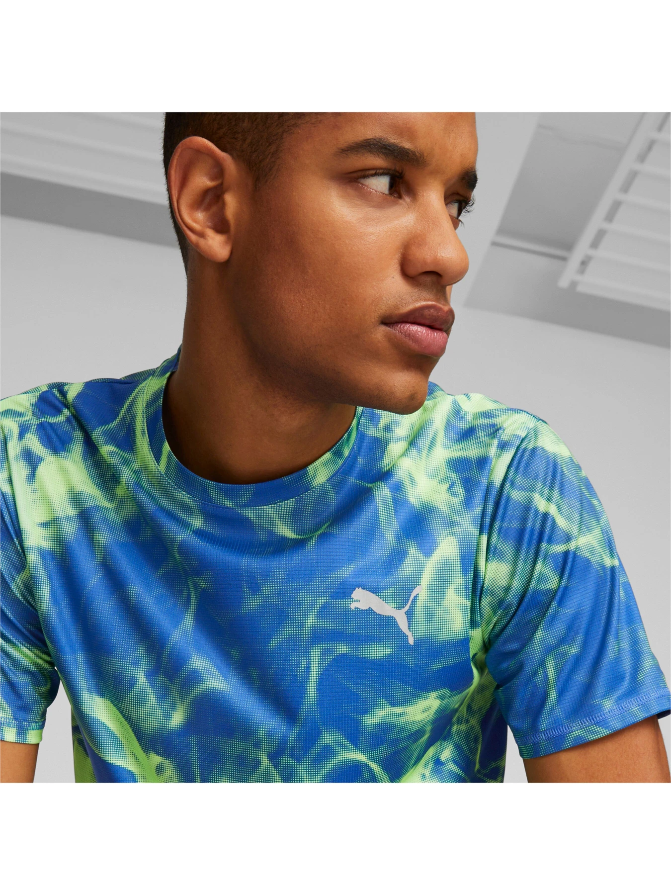 Футболки и поло PUMA Run Favorite Aop Graphic Tee модель 523268 Футболки и поло PUMA Run Favorite Aop Graphic Tee модель 523268 Фото