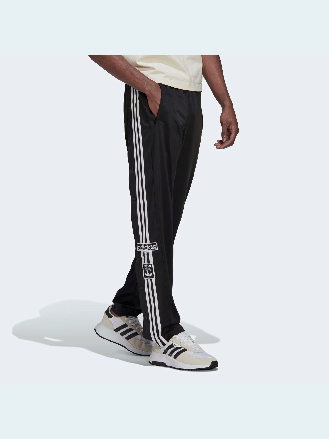 Брюки Adidas Adicolor модель HN6098 Брюки Adidas Adicolor модель HN6098 Фото