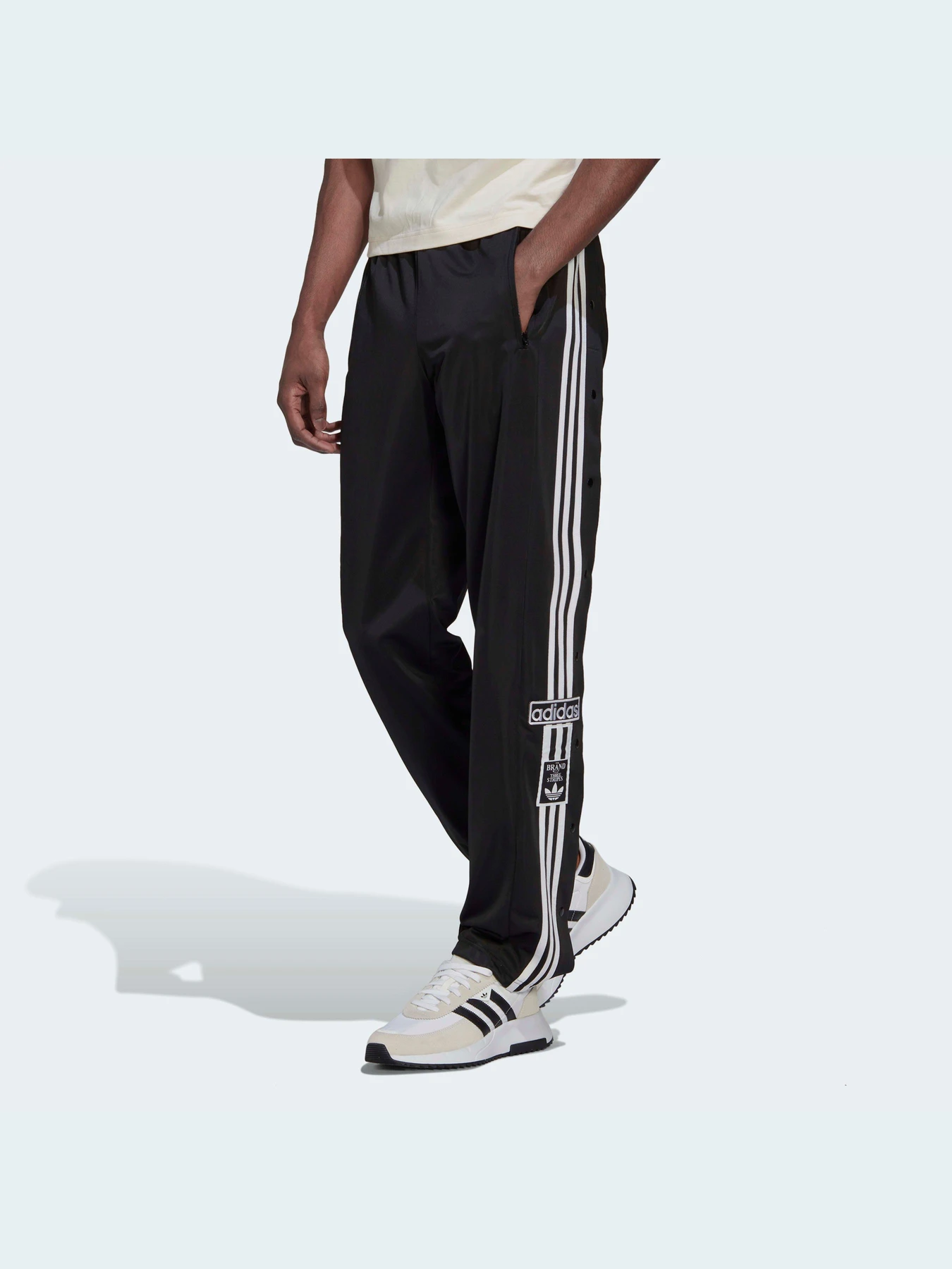 Брюки Adidas Adicolor модель HN6098 Брюки Adidas Adicolor модель HN6098 Фото