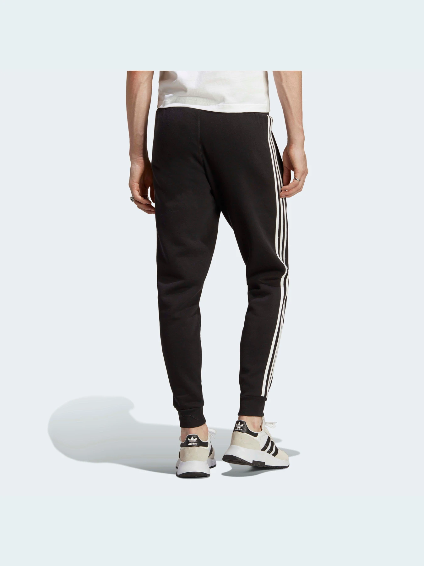 Брюки Adidas Adicolor модель GN3458 Брюки Adidas Adicolor модель GN3458 Фото